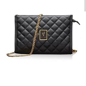 Black and gold crossbody bag from Younique